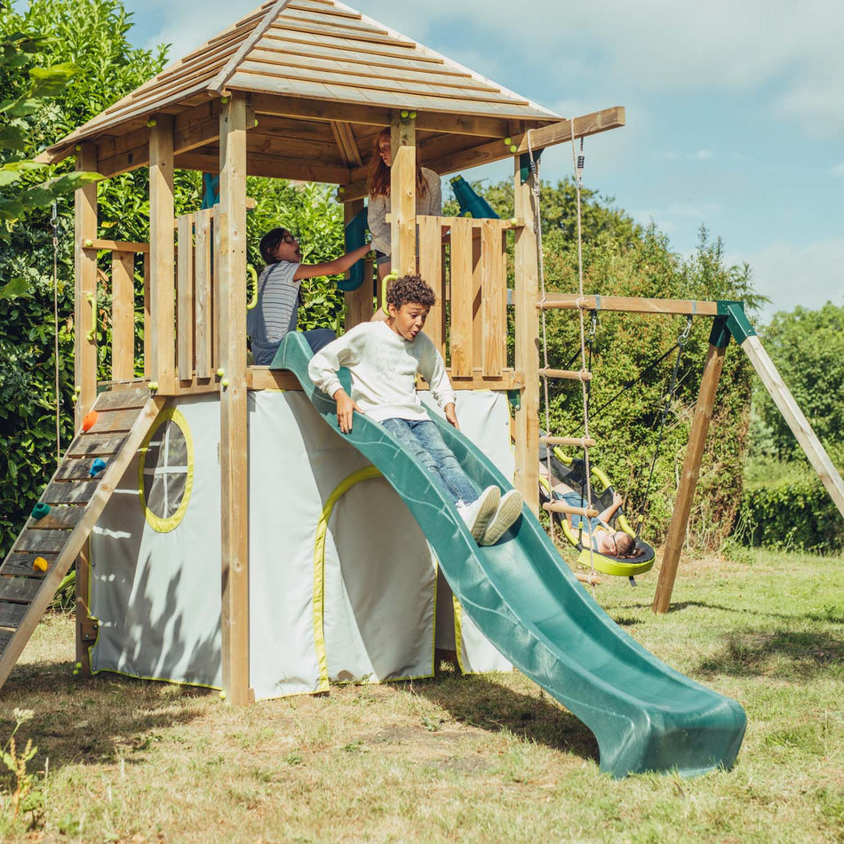 Children playing in Plum Play's Warthog Wooden Playcentre