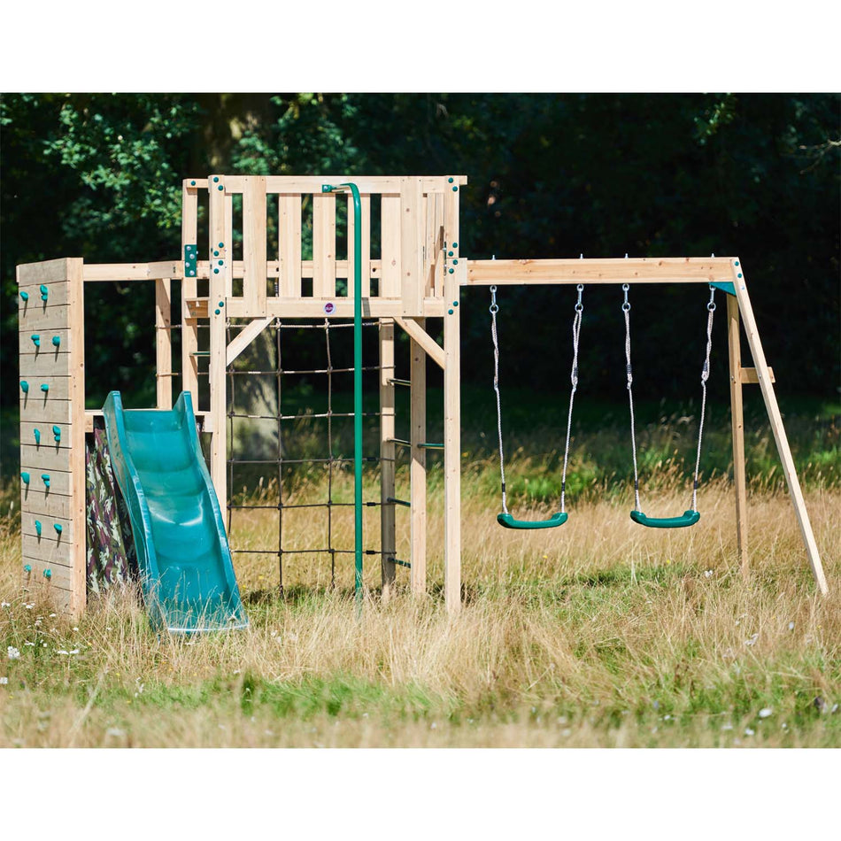 Right angle of Plum Play's Wooden Climbing Cube XL with Swing Arm in a lawn