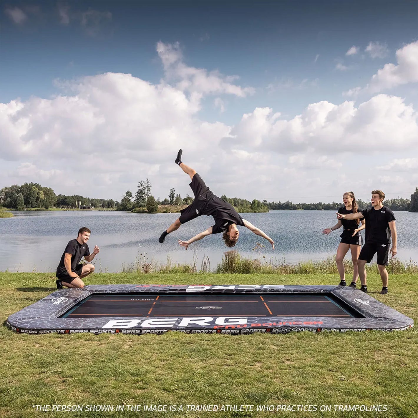 athletes having fun training on a BERG SPORTS Ultim Pro Bouncer FlatGround Rectangular Trampoline